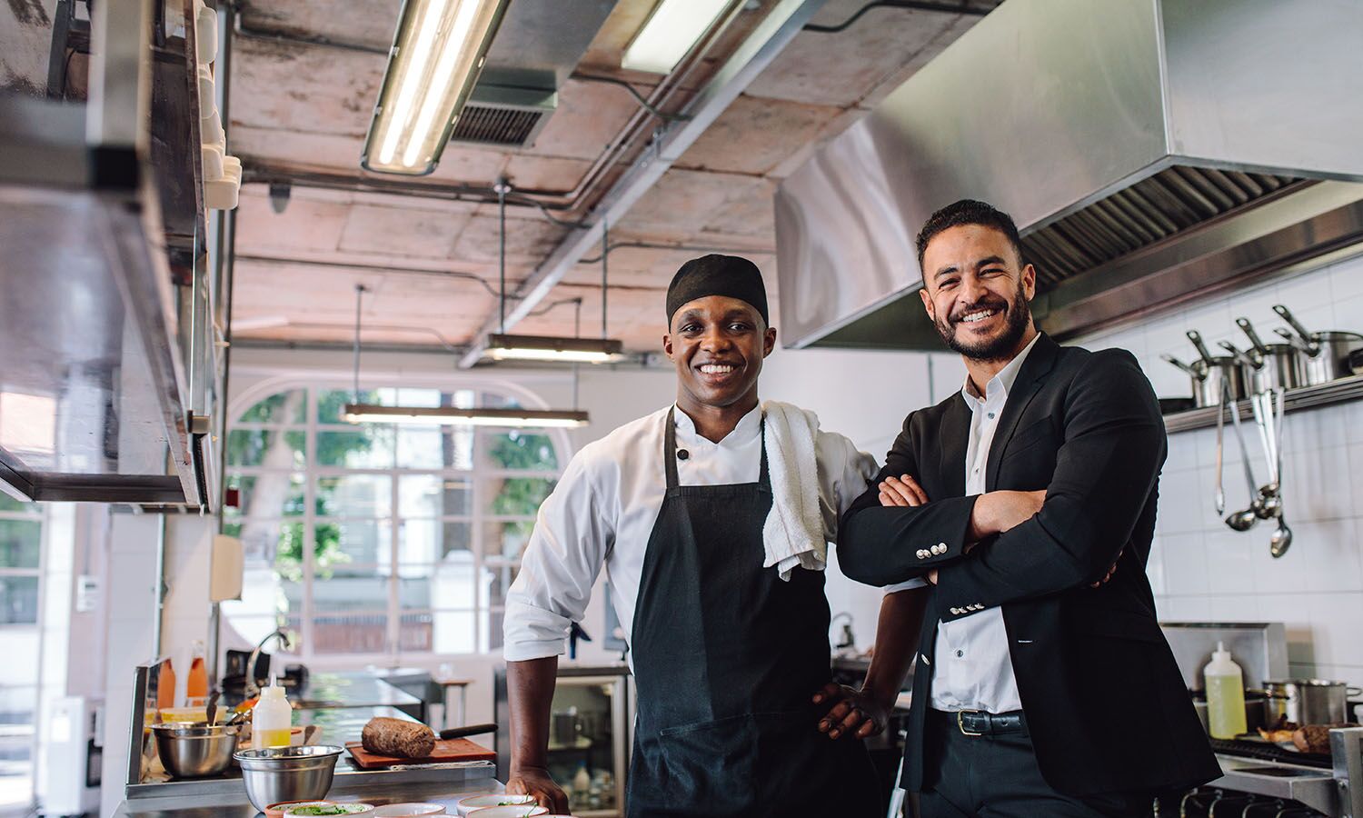 restaurant-liability Chef and Restaurant Owner in Kitchen