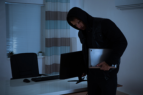 Thief Stealing Computer And Laptop