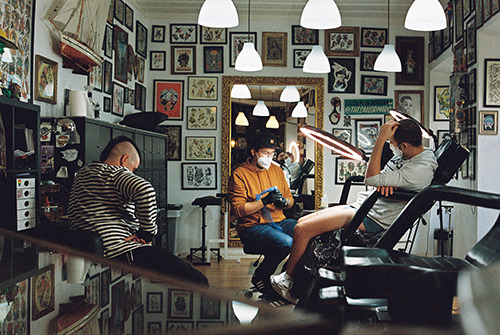 Tattoo Parlour Customer inside tattoo parlour