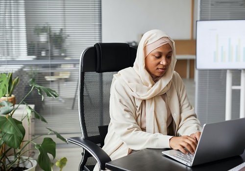 A woman doing a business name search