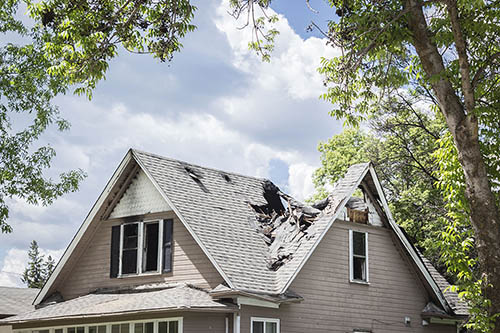 damaged roof from storm