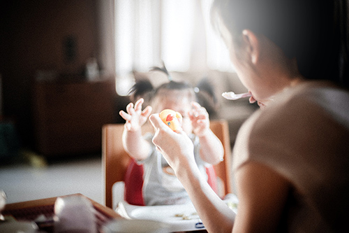 feeding-child daycare owner feed child