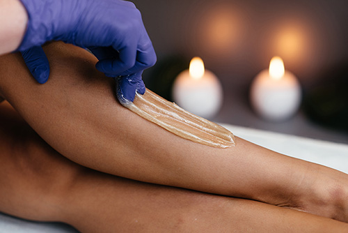 leg-hair-waxing hot wax on leg burn