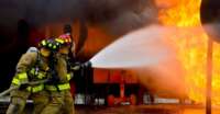 Firefighters extinguishing a blaze