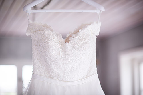 wedding dress on a hanger