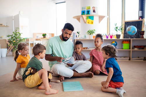 A home daycare owner caring for children.