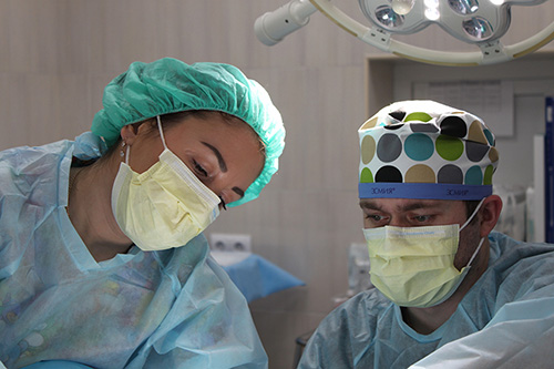 Nurse nurse helping with surgery