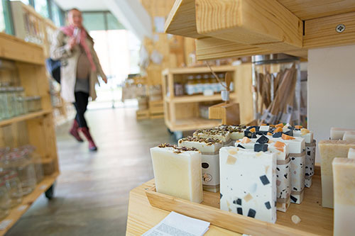 soap-store customer walking in soap store