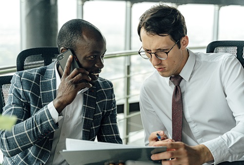 Businessmen discussing a commercial property lease agreement