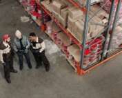Workers discussing inventory management