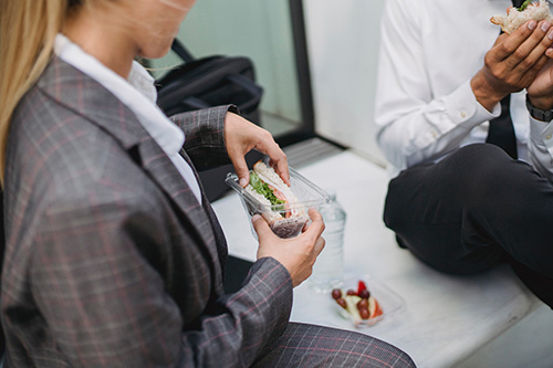 sandwich (2) customers eating pre-made sandwich