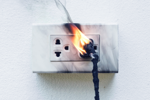 A burning electrical socket.