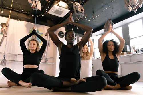 A yogi leading a yoga class.