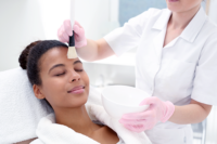 A customer of a beautician at a spa.