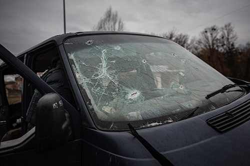 broken windshield from storm
