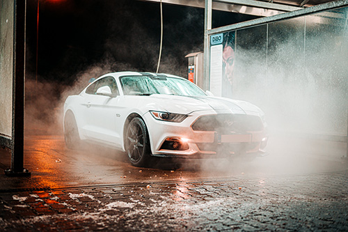 auto detailer cleaning mustang