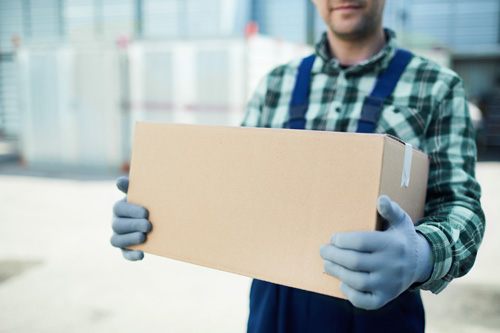 Movers handling boxes